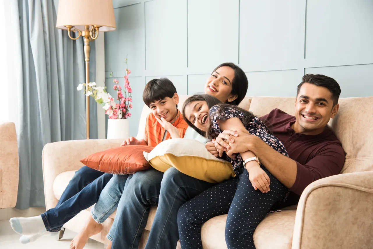 A happy family enjoying life — what One Acre Farms really delivers